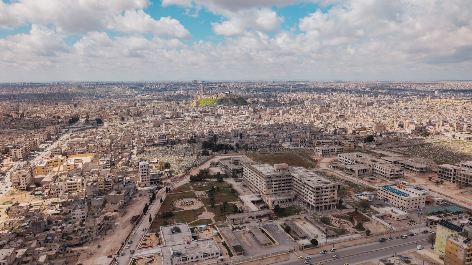 Aerial view of Aleppo, the Citadel on the horizon
